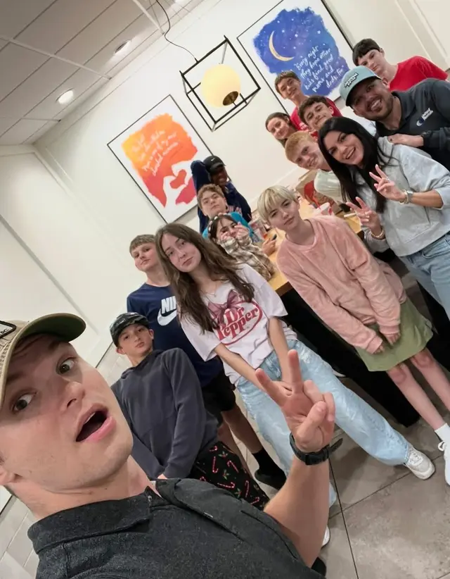 Bridge Students taking a group selfie together at a youth gathering